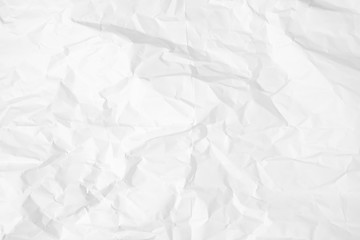 White crumpled paper texture background.