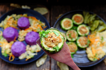 Vietnamese vegetarian eating, grilled vegetables, winter melon stuff with tofu, carrot, violet rice dish