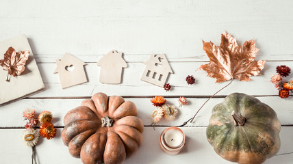 Autumn background with different objects and pumpkin. Flat-lay.