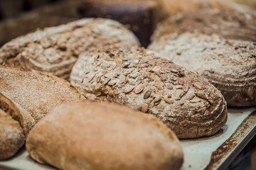 Fresh bread on the counter in the store, close-up .