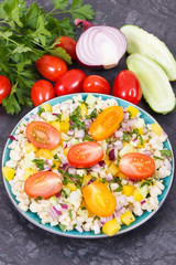 Fresh salad with bulgur groats and vegetables as best food for dieting and slimming
