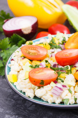 Fresh salad with bulgur groats and vegetables as best food for dieting and slimming