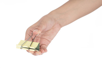 Hand holding yellow binder clips isolated on white background