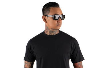 Portrait of young man wearing black plain t shirt isolated on white background. Hipster man with tattoo wearing black t shirt. Ready for mock up design template or background