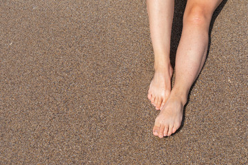 Bare feet at the beach