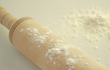 Baking flour and wooden rolling pin