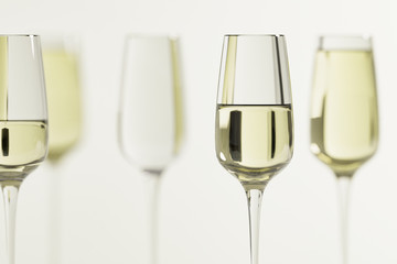 glasses of white wine on blurred background 3d render