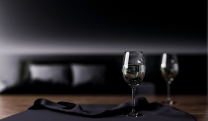 glasses of wine on table in dark bedroom, 3d rendering