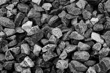 Black small road stone background, dark gravel pebbles stone texture, granite,marble