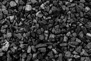 Black small road stone background, dark gravel pebbles stone texture, granite,marble