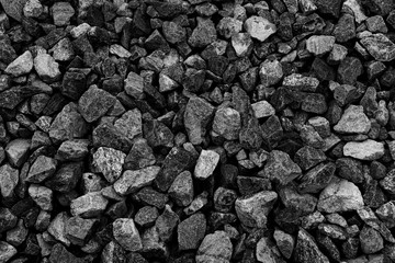 Black small road stone background, dark gravel pebbles stone texture, granite,marble