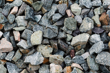 Black small road stone background, dark gravel pebbles stone texture, granite,marble