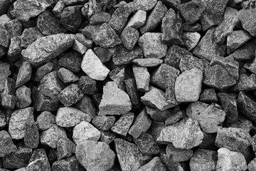 Black small road stone background, dark gravel pebbles stone texture, granite,marble