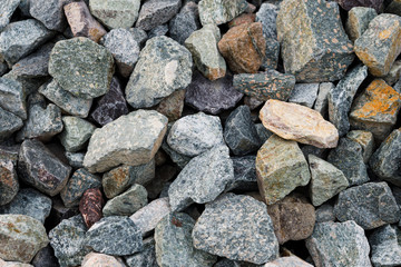 Black small road stone background, dark gravel pebbles stone texture, granite,marble