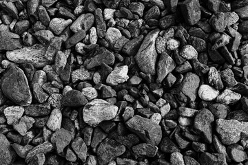 Black small road stone background, dark gravel pebbles stone texture, granite,marble