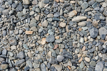 Small road stone background, gravel pebbles stone texture, granite,marble