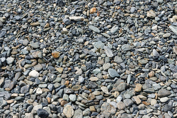 Small road stone background, gravel pebbles stone texture, granite,marble