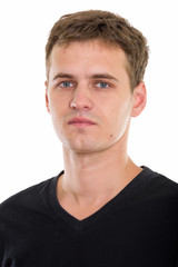 Obraz premium Studio shot of young man isolated against white background