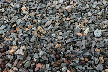 Small road stone background, gravel pebbles stone texture, granite,marble