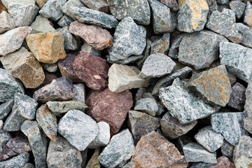 Small road stone background, gravel pebbles stone texture, granite,marble
