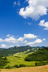 Fototapeta na wymiar Rabštin and Šlachtovsky Mount in Pieniny Mountains. View from near Aksamitka Mount, Slovakia.