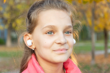 portrait of a girl in autumn park