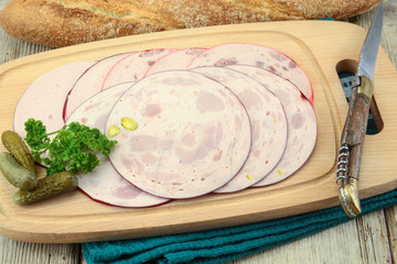 ham roll on a cutting board