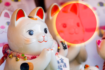 Japanese lucky cat made a greeting card with the red sun as a symbol (subtitle: Lucky Cat, Jin Yun...