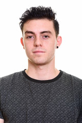 Fototapeta premium Studio shot of young handsome man isolated against white background