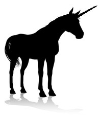 A unicorn silhouette mythical horned horse graphic