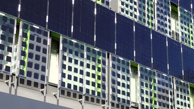 Solar panels on the building wall.