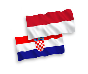 Flags of Indonesia and Croatia on a white background