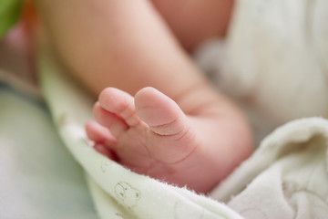 toe of newborn baby