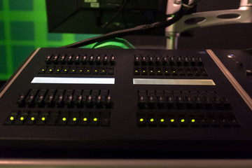 Professional audio mixing console with faders and adjusting knobs - radio / TV broadcasting - Image