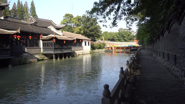 Ancient Chinese garden and small canal in Yangzhou city.
