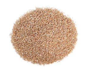 Spelt groats. Isolated on white background. Directly Above.