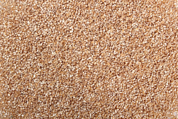 Background of spelt groats. Isolated on white background. Directly Above.