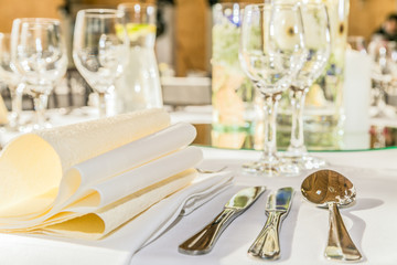 Beautiful table set for some festive event, party or wedding reception. Design, formal. Closeup