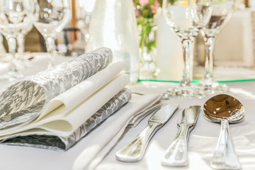 Beautiful table set for some festive event, party or wedding reception. Design, formal. Closeup