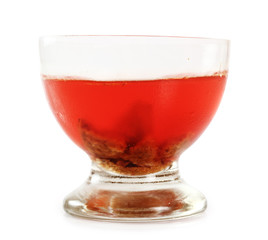 Gelatin dessert with chocolate cookies in bowl. Isolated with clipping path.