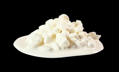 Cottage Cheese. Isolated on black background.