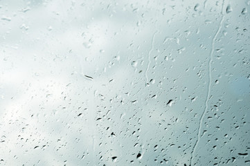 Natural background Drops on both sides of the glass from the rain and from the fogging abstract...
