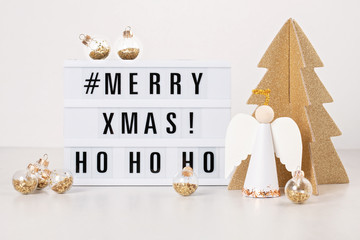 Christmas greeting card mock up. Light box with the text Merry Xmas and Christmas decoration - Powered by Adobe