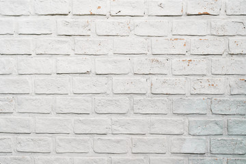 Old white painted brick wall texture background.