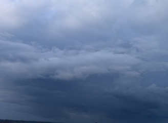 Obraz premium Heavy rain clouds. Photography, atmospheric phenomena, panoramic image of the autumn sky.