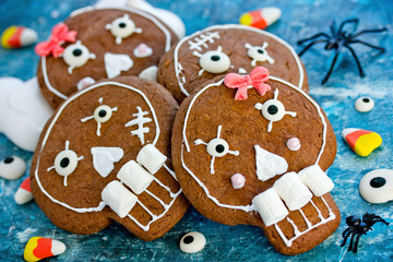 Halloween skull cookies - chocolate cookies decorated with icing and marshmallow shaped skull for kids