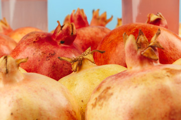 Group of pomegranate fruits close up background