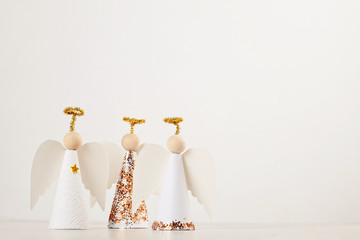 Christmas greeting card mock up with paper angel, christmas tree and decoration