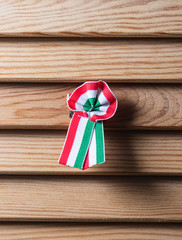 Hungarian cockade on wooden seamless background
