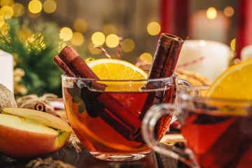 Christmas composition with Glass of glint wine on wooden table close up
